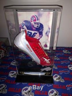 Eric Moulds Signed Game Used Cleat And Signed Picture