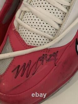 Marshawn Lynch Autographed Game Used Photomatched Cleats 10/11/09 NFL & PSA COA